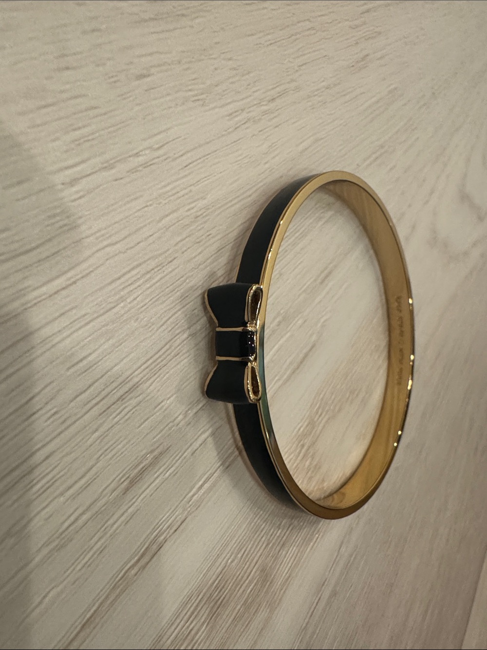 kate spade Gold-Tone Bracelet with Black Bow